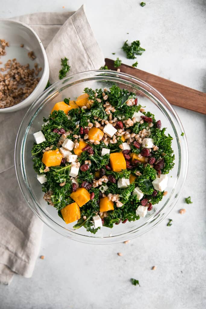 butternut squash and kale mixed in bowl.