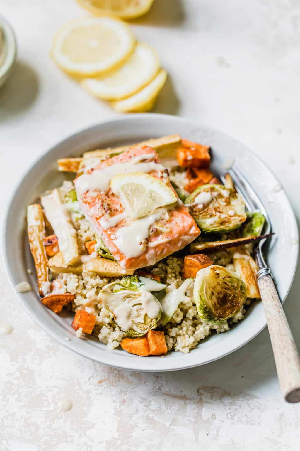 Salmon Power Bowls with lemon tahini dressing • Fit Mitten Kitchen
