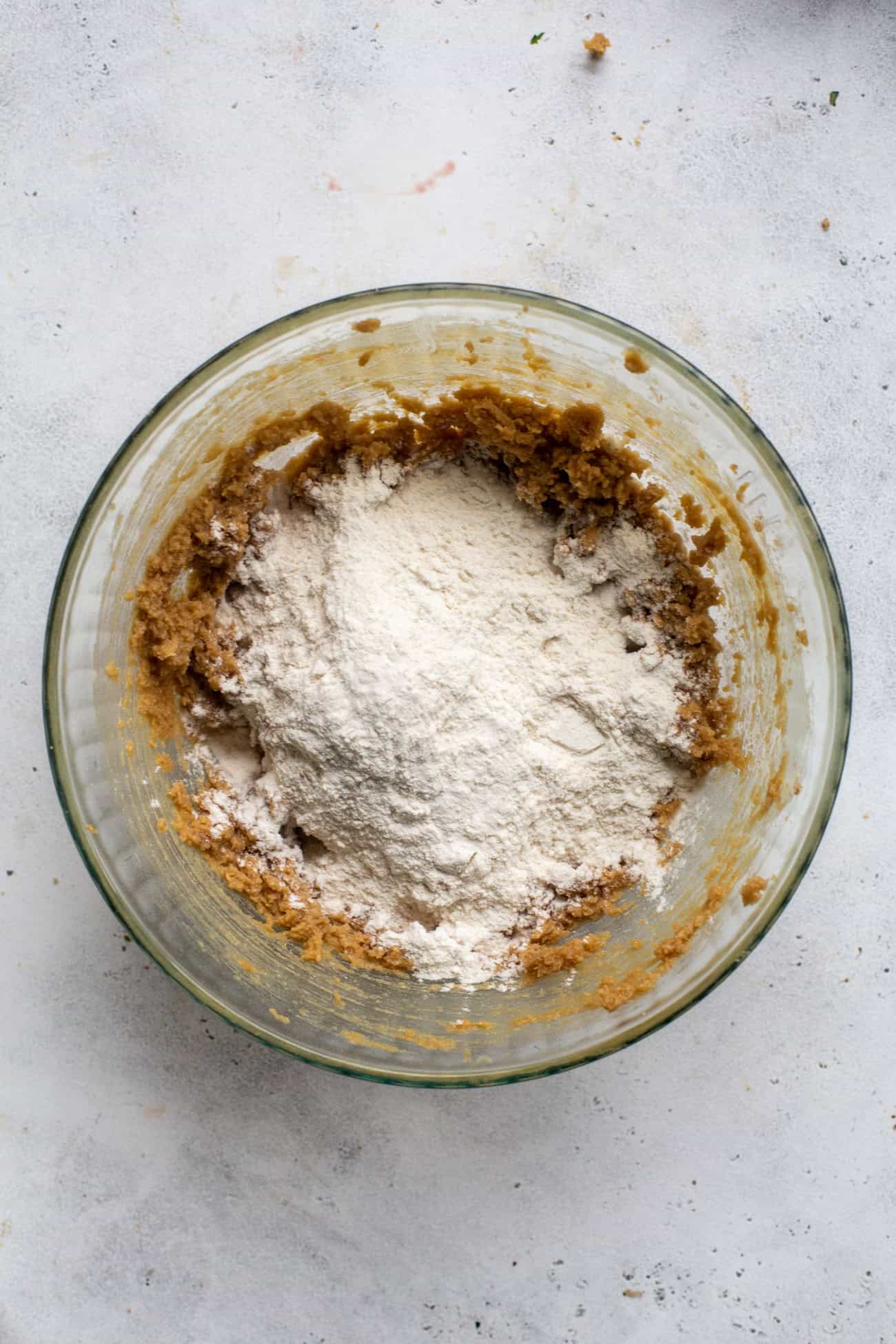 overhead view of flour in cookie dough.