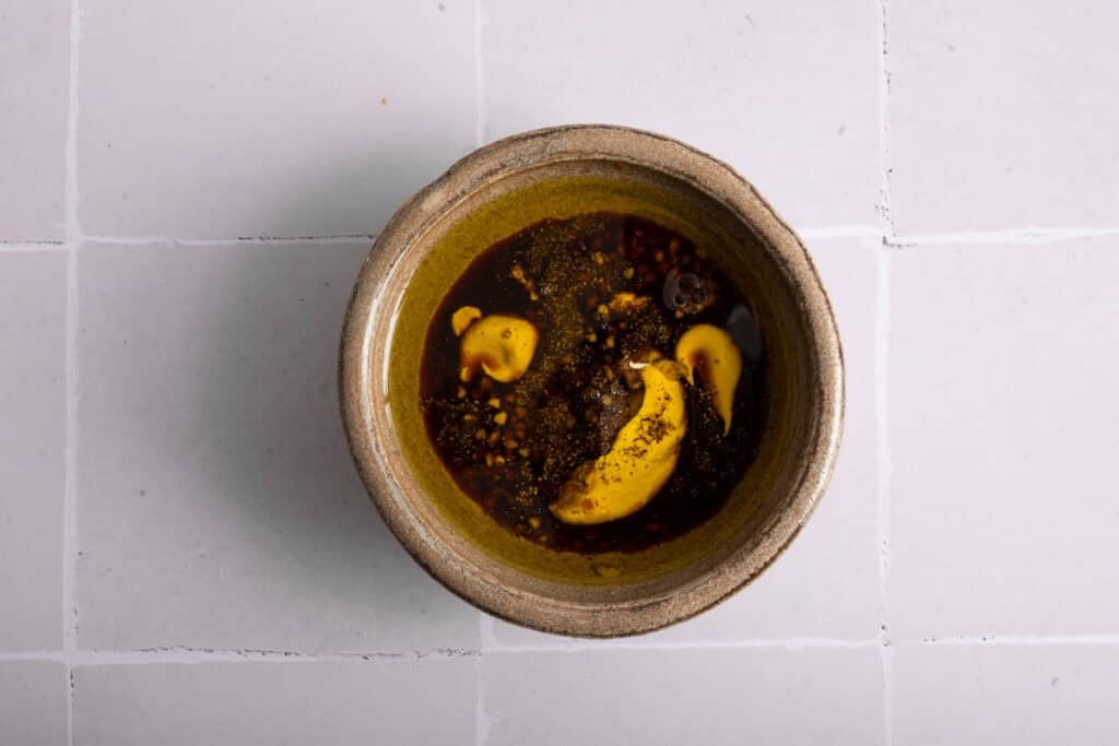 balsamic vinaigrette ingredients in bowl.