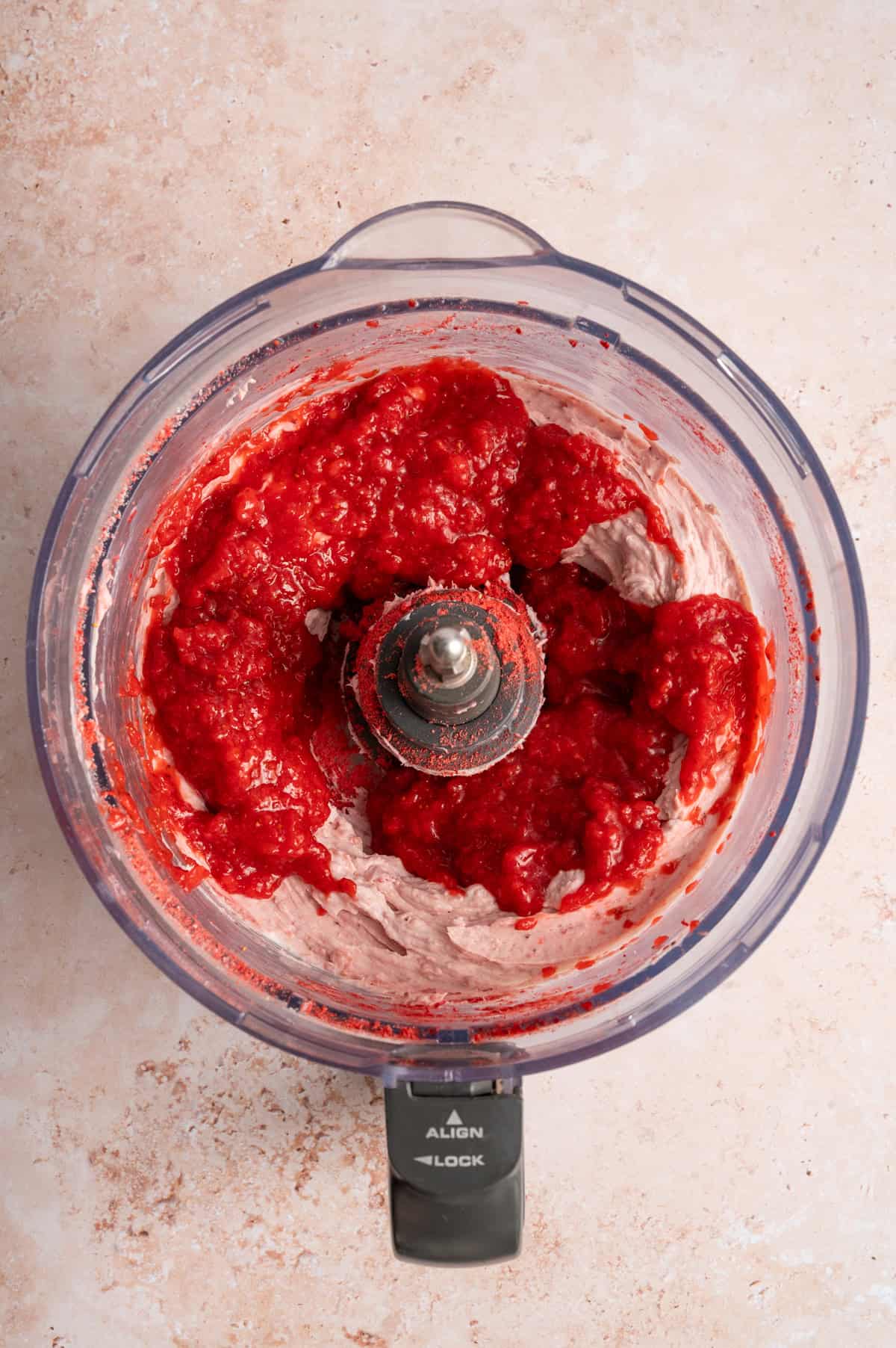 strawberry puree in food processor bowl.