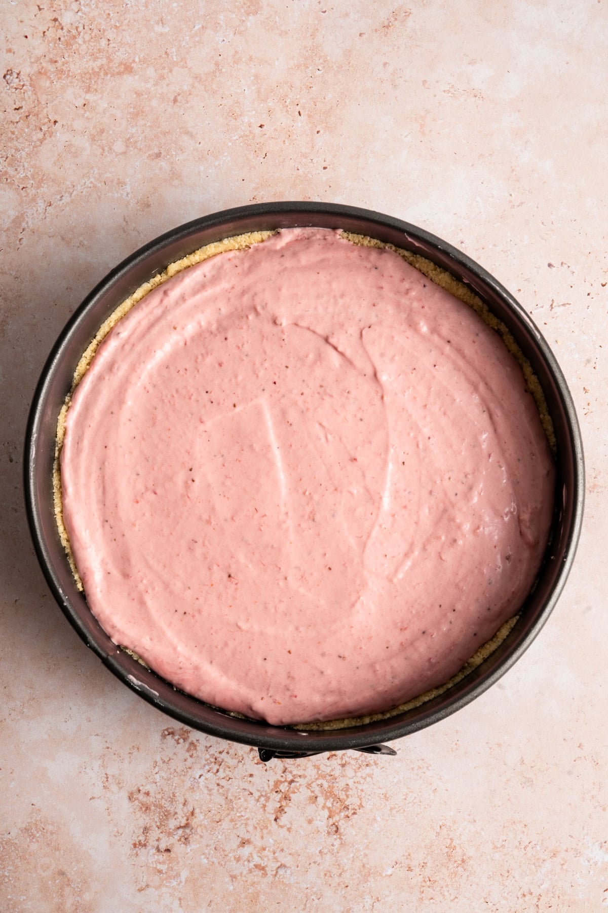 overhead view of no bake cheesecake recipe in springform pan.