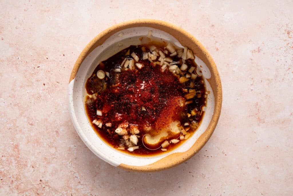 overhead view of spicy asian dressing sauce in bowl.