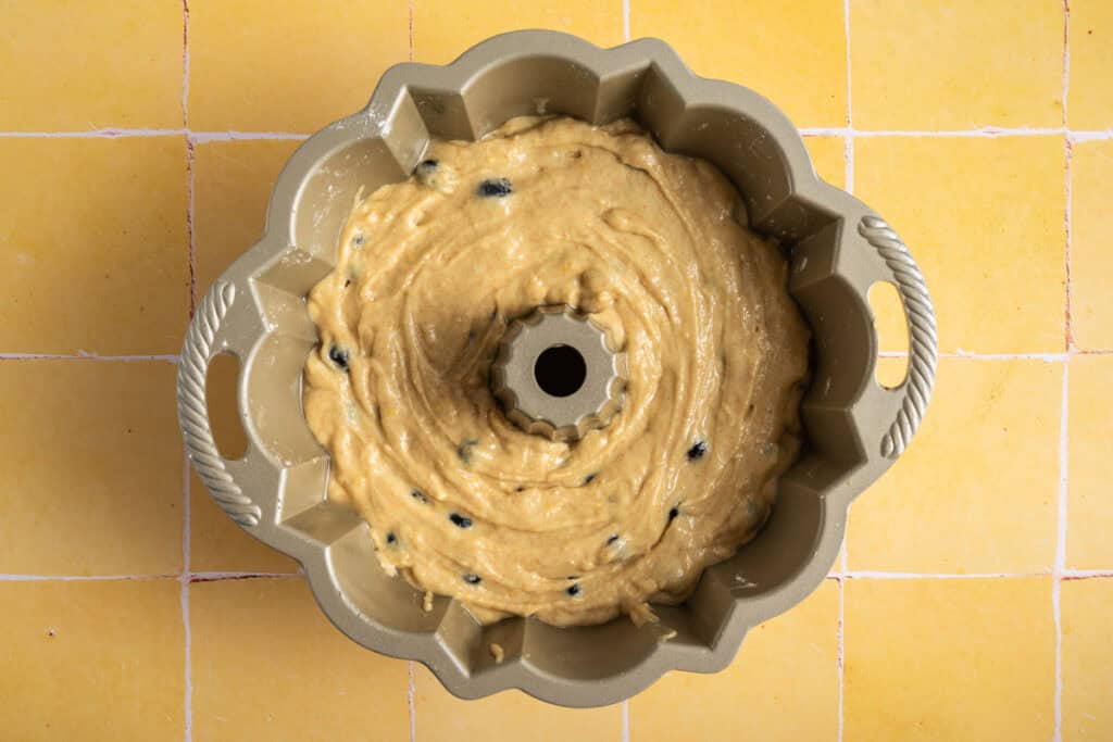 blueberry lemon cake batter in bundt pan.
