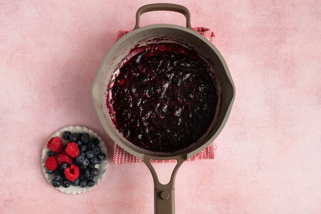 berry compote with fresh raspberries in blueberries.